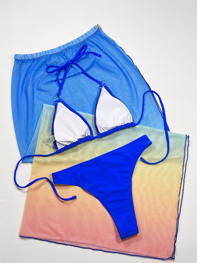 Trendsi three piece bikini set with skirt featuring white and blue triangle top and bright blue bottoms