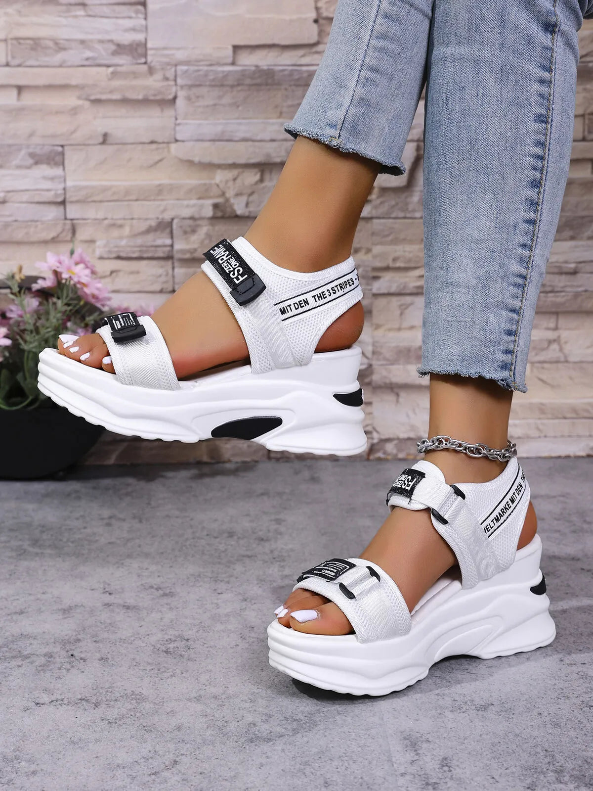 Trendsi white Platform Sport Sandals with chunky Velcro straps and thick sole worn with cropped jeans
