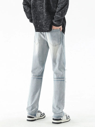 Trendsi men's distressed straight jeans light wash back view with faded whiskering knee seam and sneakers